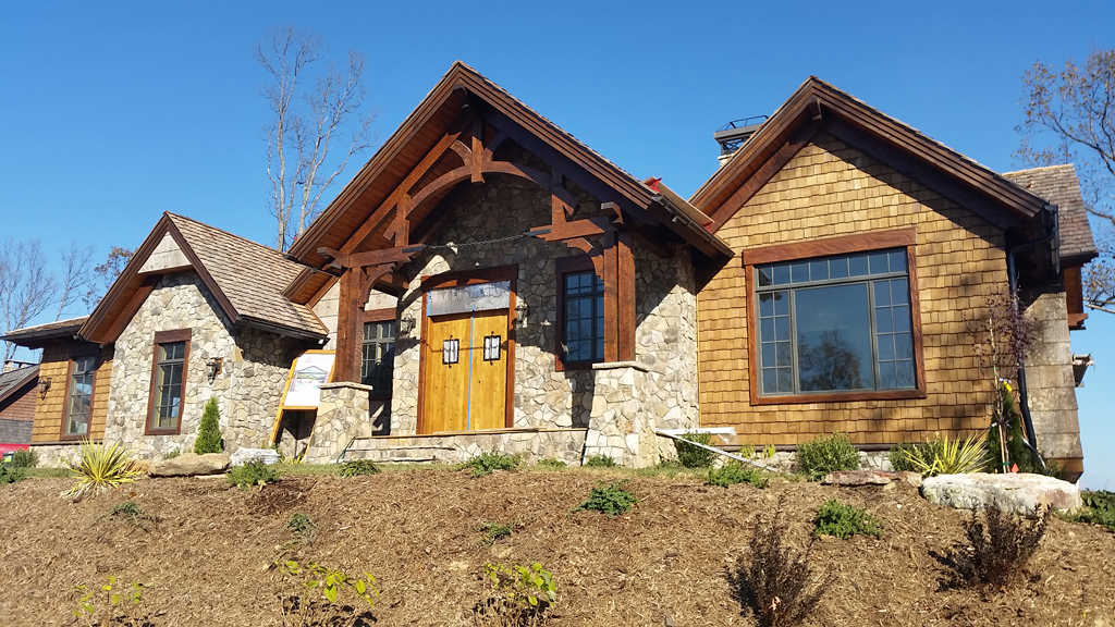 Rustic stone and wood house front exterior