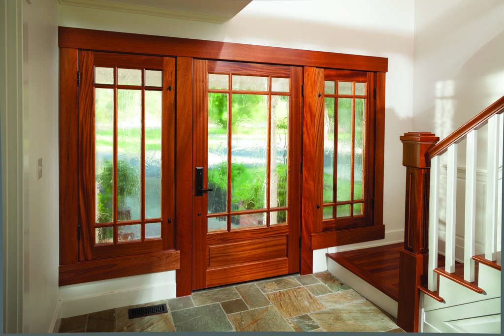 Wooden front door with glass sidelights