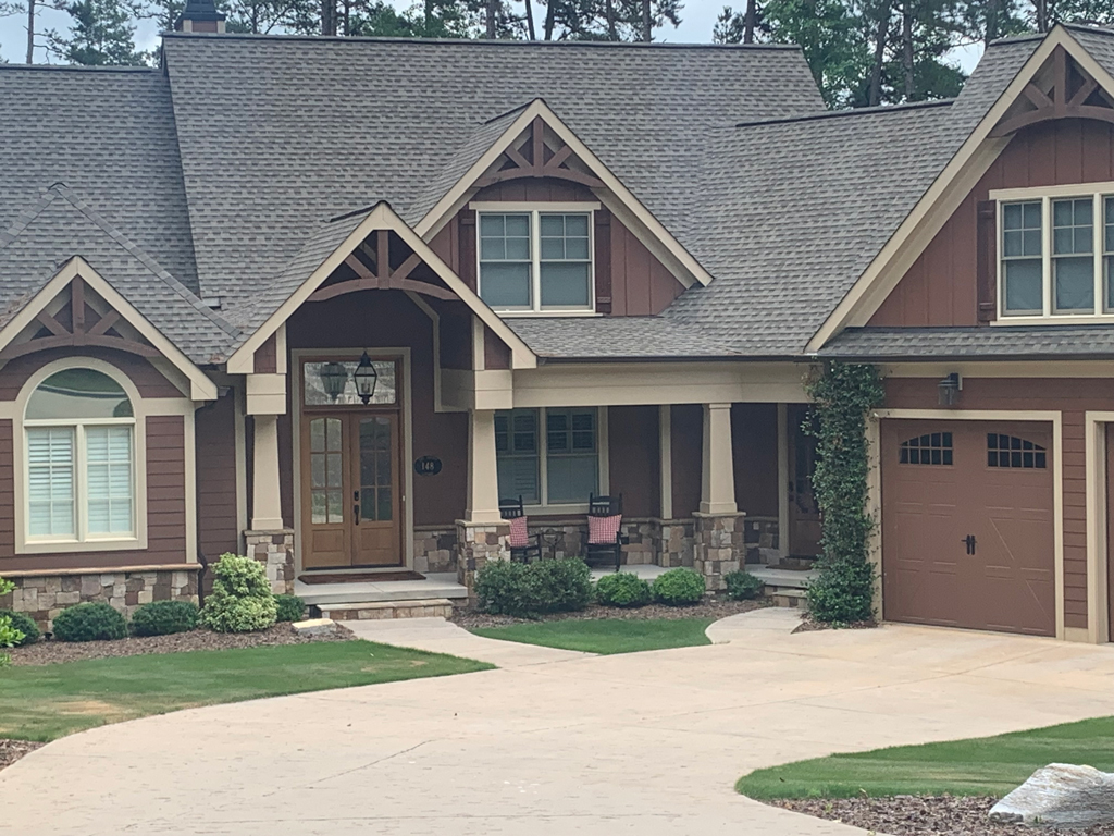 Craftsman-style home with front porch, garage