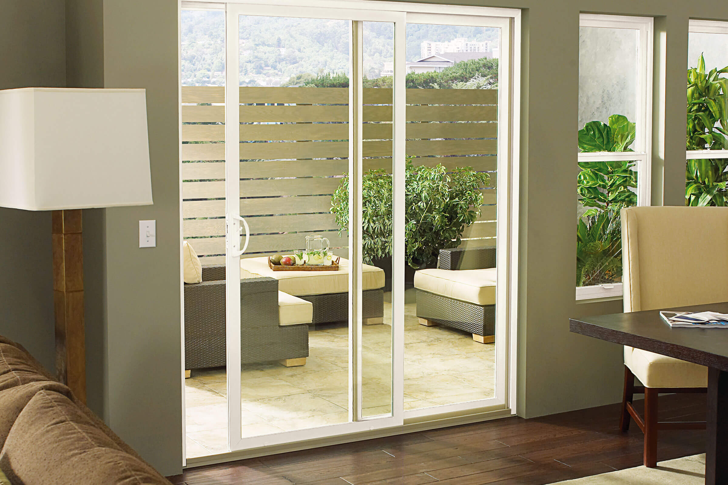 Sliding glass door opening to patio seating